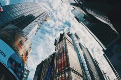 区块链视角下的理想小区选择：从技术赋能到社区治理